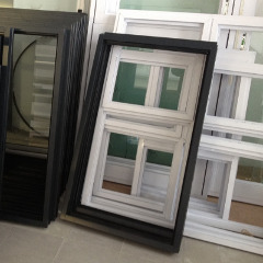 Stacked white and copper aluminium casement window frames